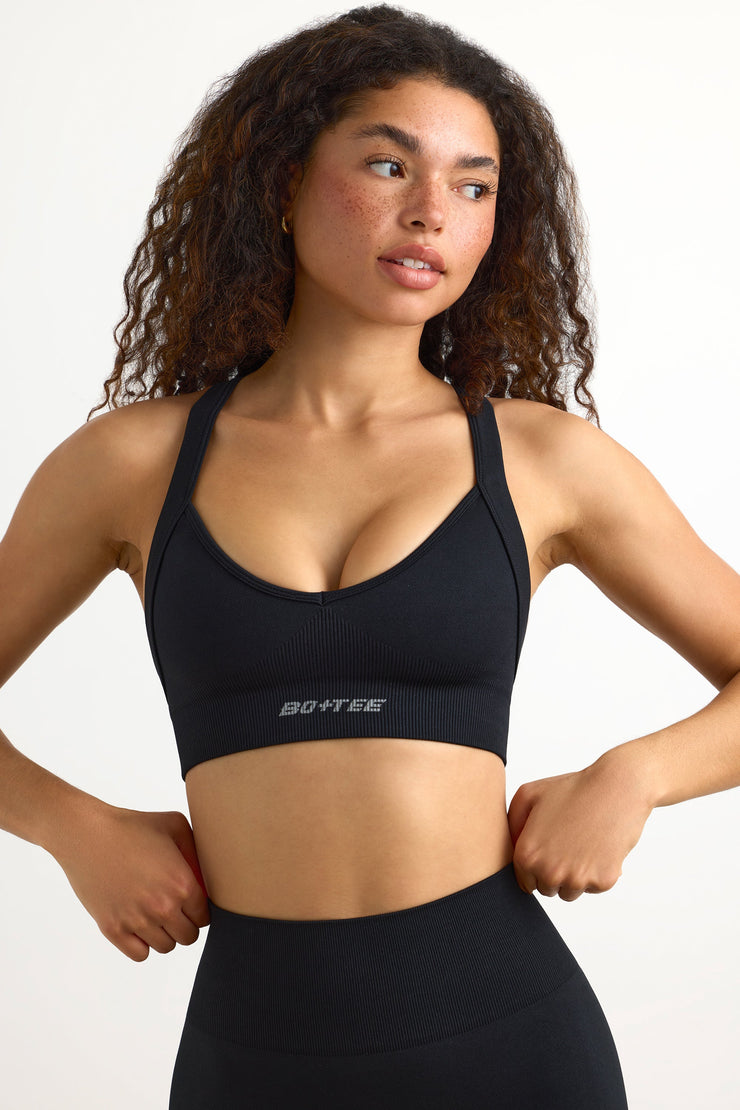 Super Sculpt Seamless Cross-Back Sports Bra in Black