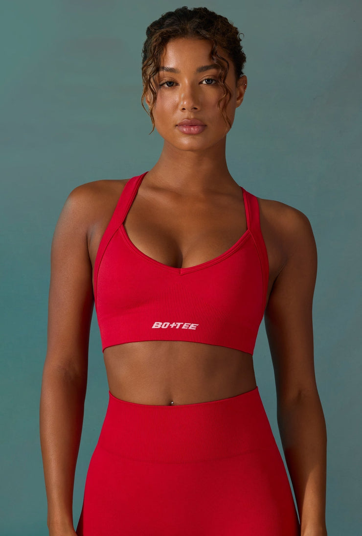 Purpose - Super Sculpt Seamless Cross Back Sports Bra in Tango Red