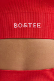 Define Luxe Halterneck Sports Bra in Poppy Red